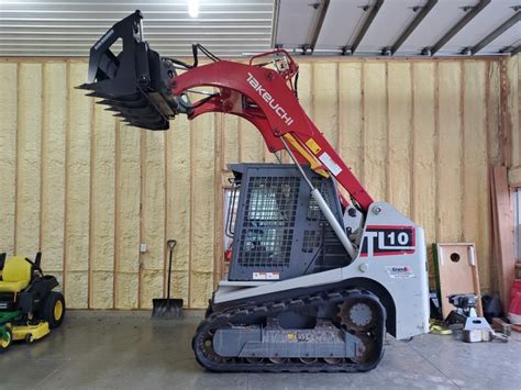 takeuchi skid steer bucket removal|skid steer bucket attachment.